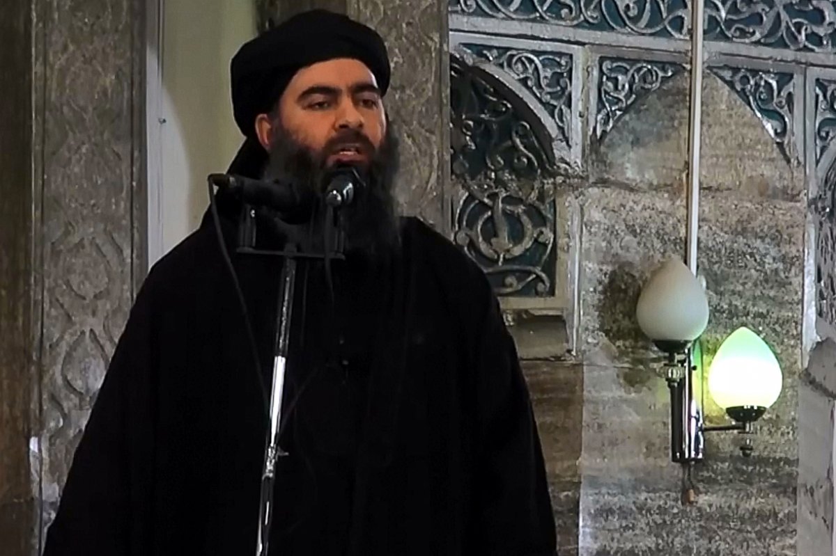 PHOTO: An image grab taken from a video released on July 5, 2014 by Al-Furqan Media shows alleged Islamic State of Iraq and the Levant leader Abu Bakr al-Baghdadi preaching during Friday prayer at a mosque in Mosul.