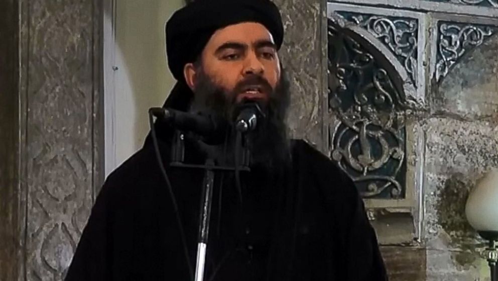 PHOTO: An image grab taken from a video released on July 5, 2014 by Al-Furqan Media shows alleged Islamic State of Iraq and the Levant leader Abu Bakr al-Baghdadi preaching during Friday prayer at a mosque in Mosul.