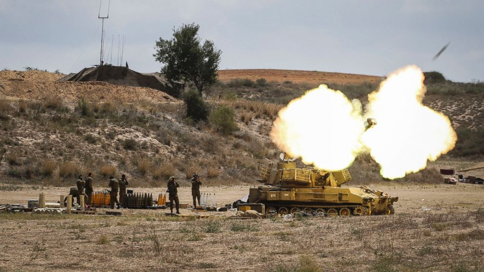 PHOTO: An Israeli artillery shell is fired at the border with Gaza, July 18, 2014, near Sderot, Israel.