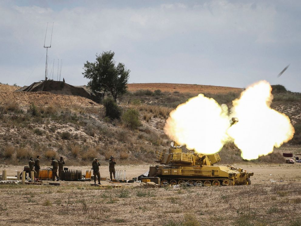 PHOTO: An Israeli artillery shell is fired at the border with Gaza, July 18, 2014, near Sderot, Israel.