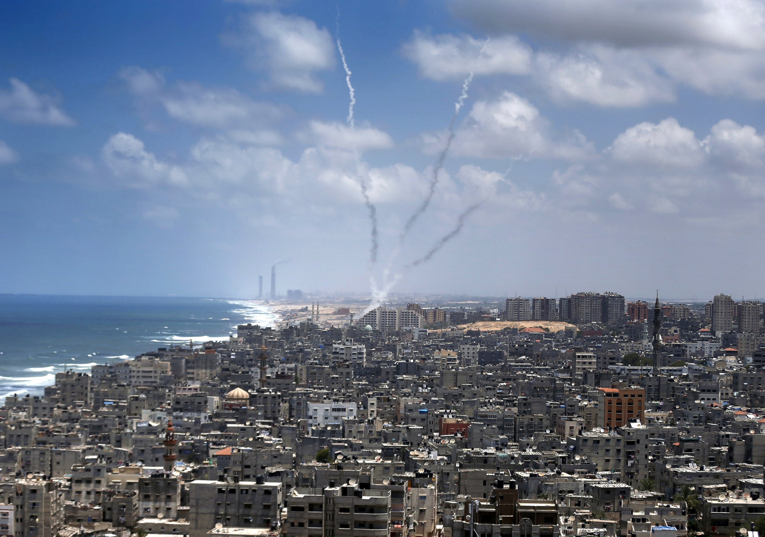 PHOTO: Smoke from rockets fired from Gaza City are seen after being launched toward Israel, July 15, 2014.