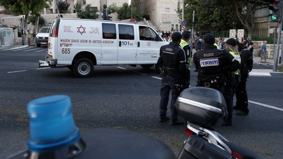 Israeli police cordon off the site where Yishai Shlissel, an ultra-orthodox Jew, stabbed six people taking part in a Gay Pride march in central Jerusalem on July 30, 2015.