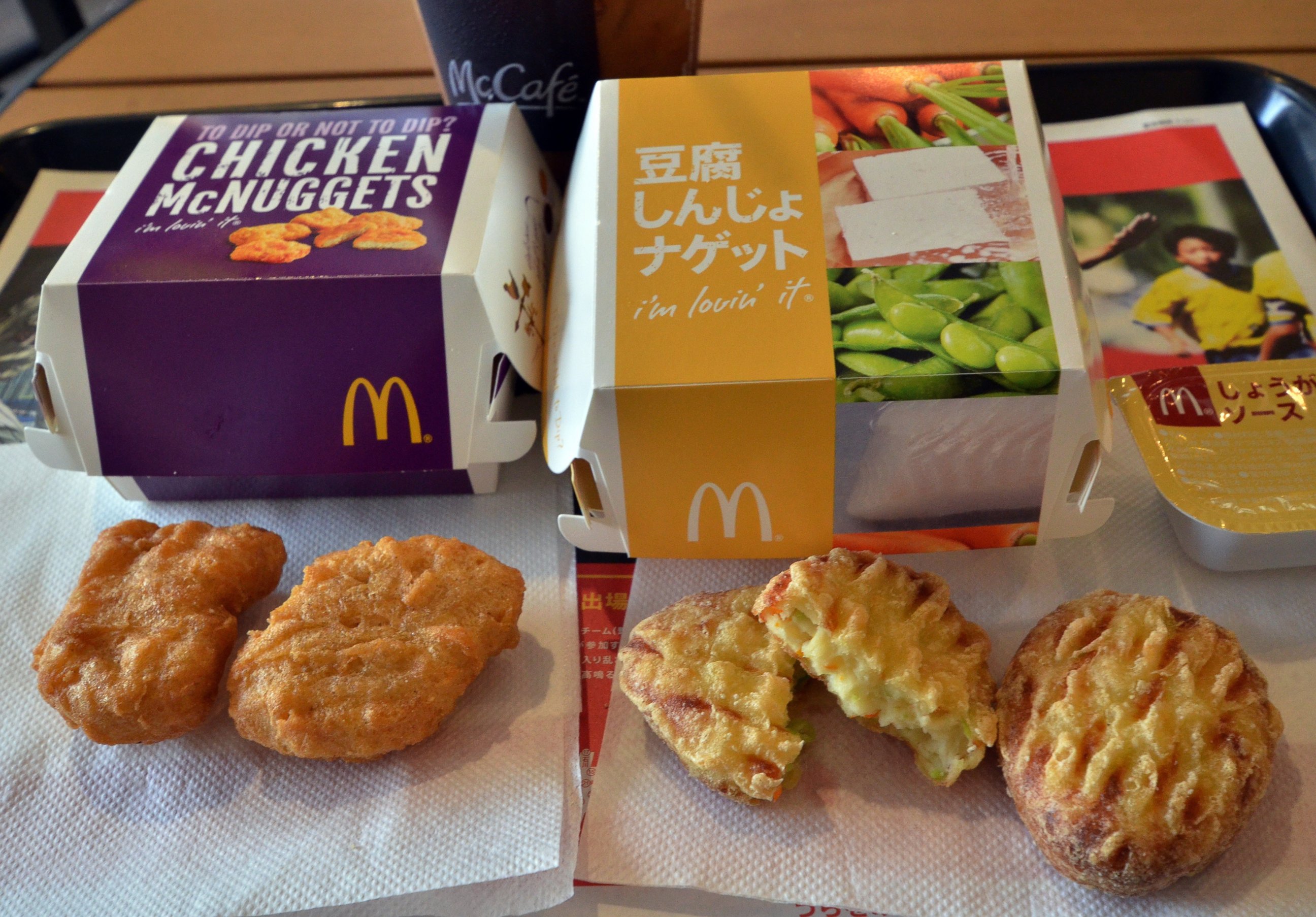 PHOTO: Tofu Shinjo Nuggets, right, and Chicken McNuggets, left, are displayed at a McDonald's restaurant in Tokyo on July 30, 2014. 