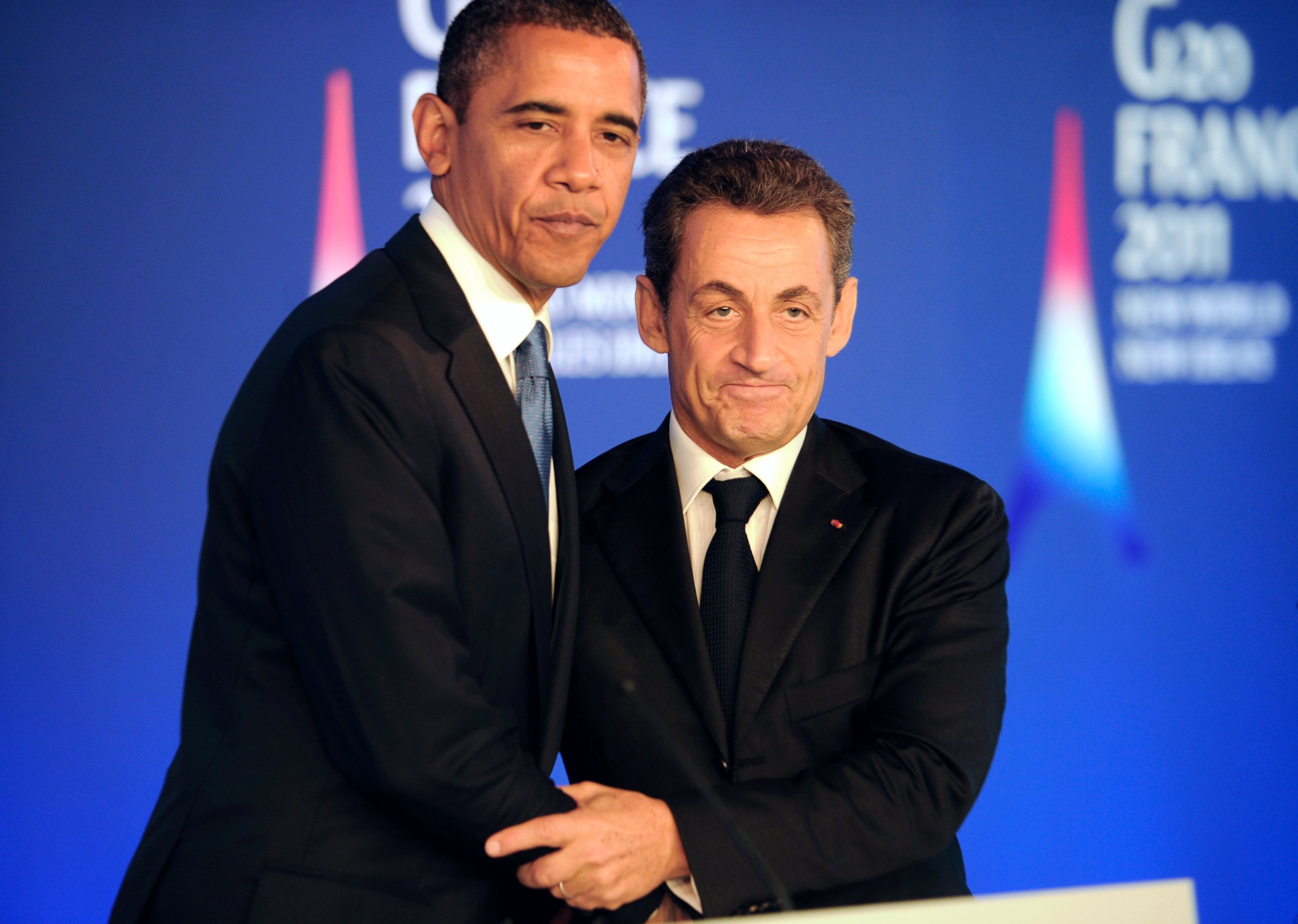 PHOTO: Barack Obama, left, and Nicolas Sarkozy shake hands as they hold a joint press conference, ahead of the start of the G20 Summit, Nov. 3, 2011, in Cannes, France.  