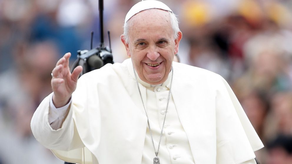 Pope Francis waves as he arrives at St. Peter's Square for his weekly audience on Sept. 17, 2014 in Vatican City, Vatican. 
