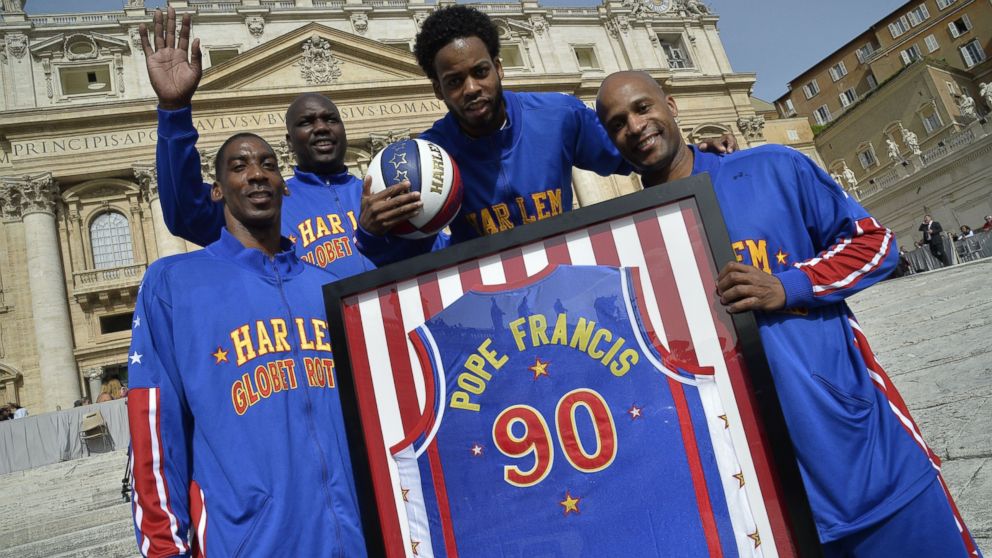 The Harlem Globetrotters teach Pope Francis how to spin a basketball on his  fingers 
