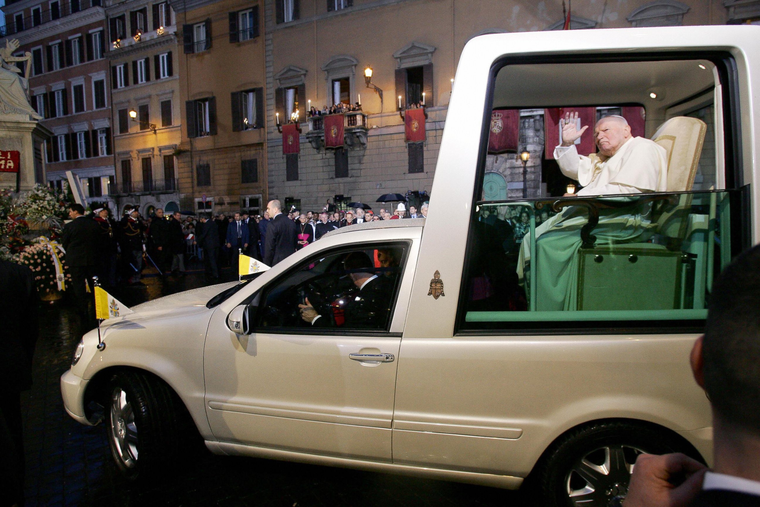 PHOTO: Pope John Paul II blesses the statue of the Virgin Mary on Dec. 8, 2004 as he leaves in his Popemobile from Rome's central square of Piazza di Spagna, after celebrating the traditional feast of the Immaculate Conception. 