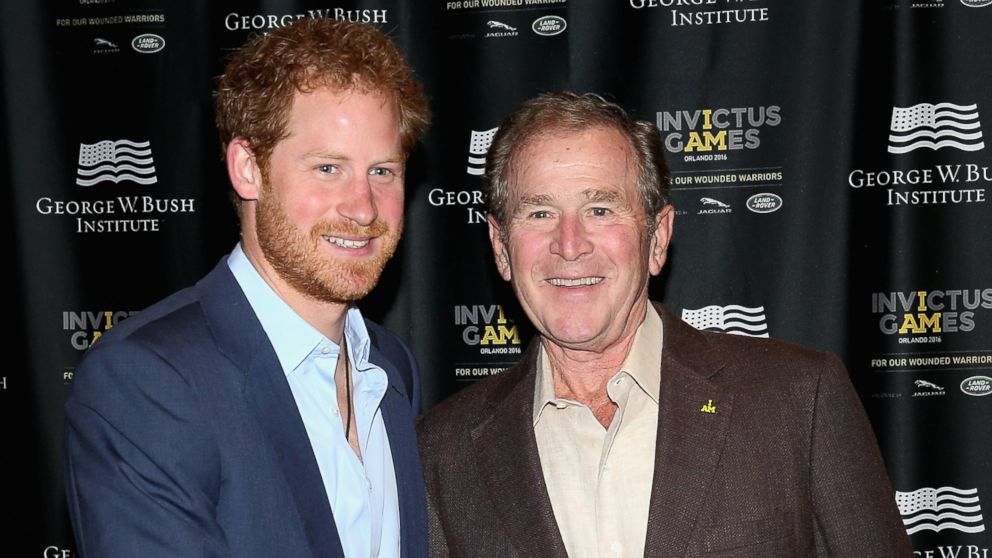 Prince Harry meets Former President George W. Bush at a Symposium of Invisible Wounds at the Shades of Green resort at Invictus Games Orlando 2016 at ESPN Wide World of Sports, May 8, 2016 in Orlando, Fla.