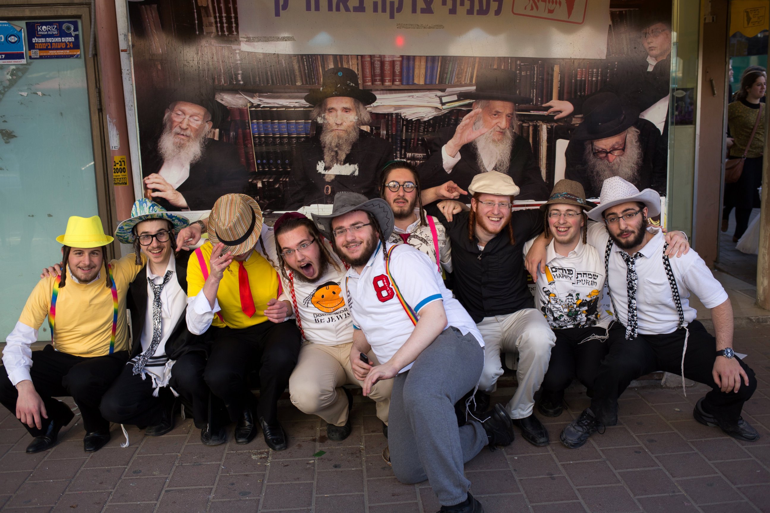 PHOTO: Orthodox Jewish youth pose during celebration of the feast of Purim in the Israeli city of Bnei Brak, near the coastal city of Tel Aviv, on March 5, 2015. 