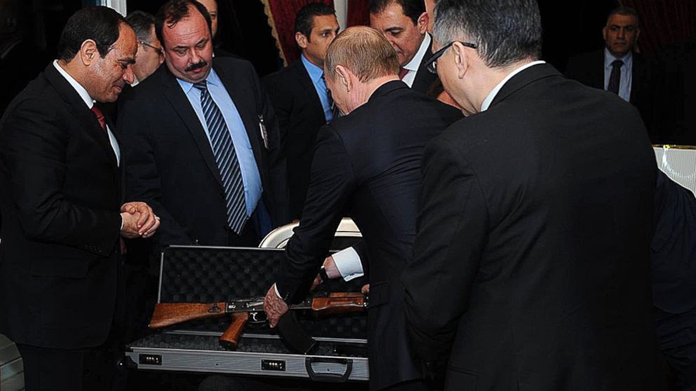 PHOTO: Russian President Vladimir Putin gives an AK-47 rifle as a gift to Egyptian President Abdel Fattah el-Sissi during an informal dinner in honor of Putin at Cairo Tower, Feb. 9, 2015, in Cairo. 
