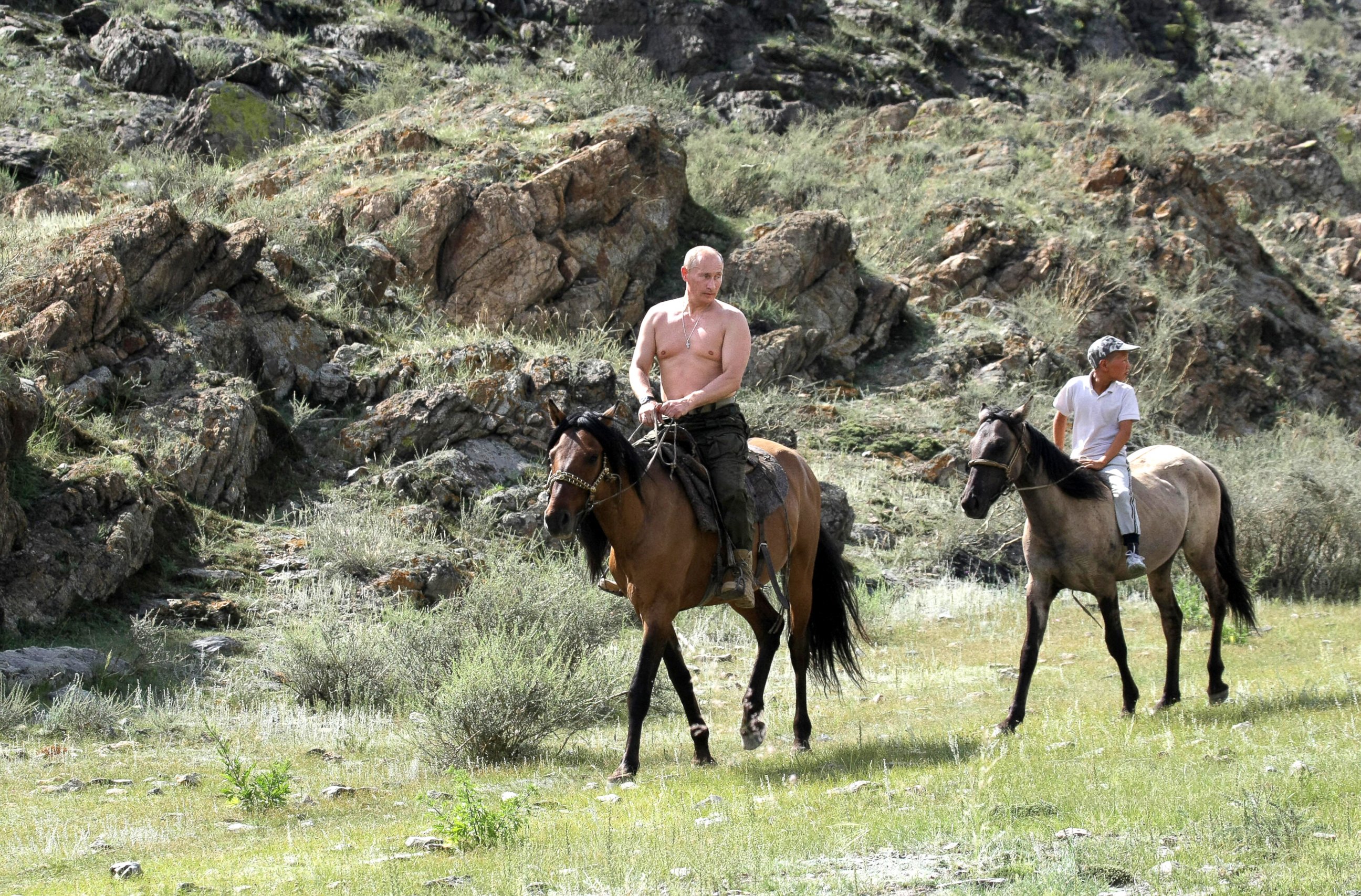 PHOTO: Then Russian Prime Minister Vladimir Putin rides a horse during his vacation outside the town of Kyzyl, Siberia, August 3, 2009.