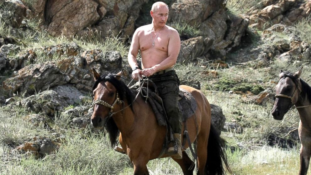 Then Russian Prime Minister Vladimir Putin rides a horse during his vacation outside the town of Kyzyl, Siberia, August 3, 2009.