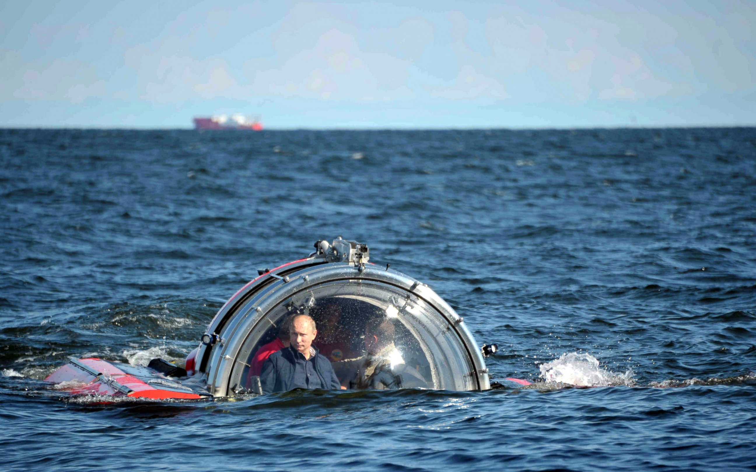 PHOTO: Russian President Vladimir Putin submerges on board Sea Explorer 5 bathyscaphe near the isle of Gogland in the Gulf of Finland, July 15, 2013, visiting Oleg frigate which sink in 1869.