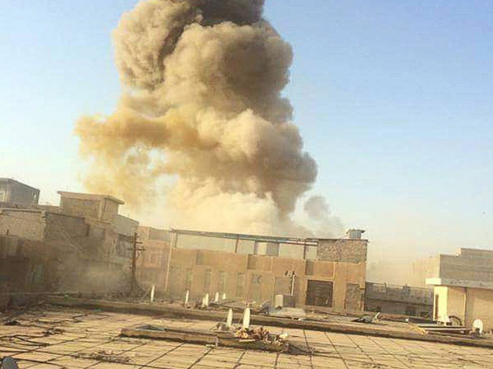 PHOTO: An Islamic State car bomb explodes at the gate of a government building near the provincial governors compound in Ramadi, Iraq, on Saturday, May 16, 2015, during heavy fighting that saw most of the city fall to the militants.