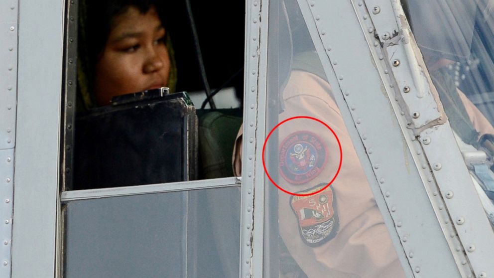 This Sept. 8, 2012 file photo shows a helicopter pilot with a patch on his uniform that appears to be that of the U.S. State Department’s Air Wing.