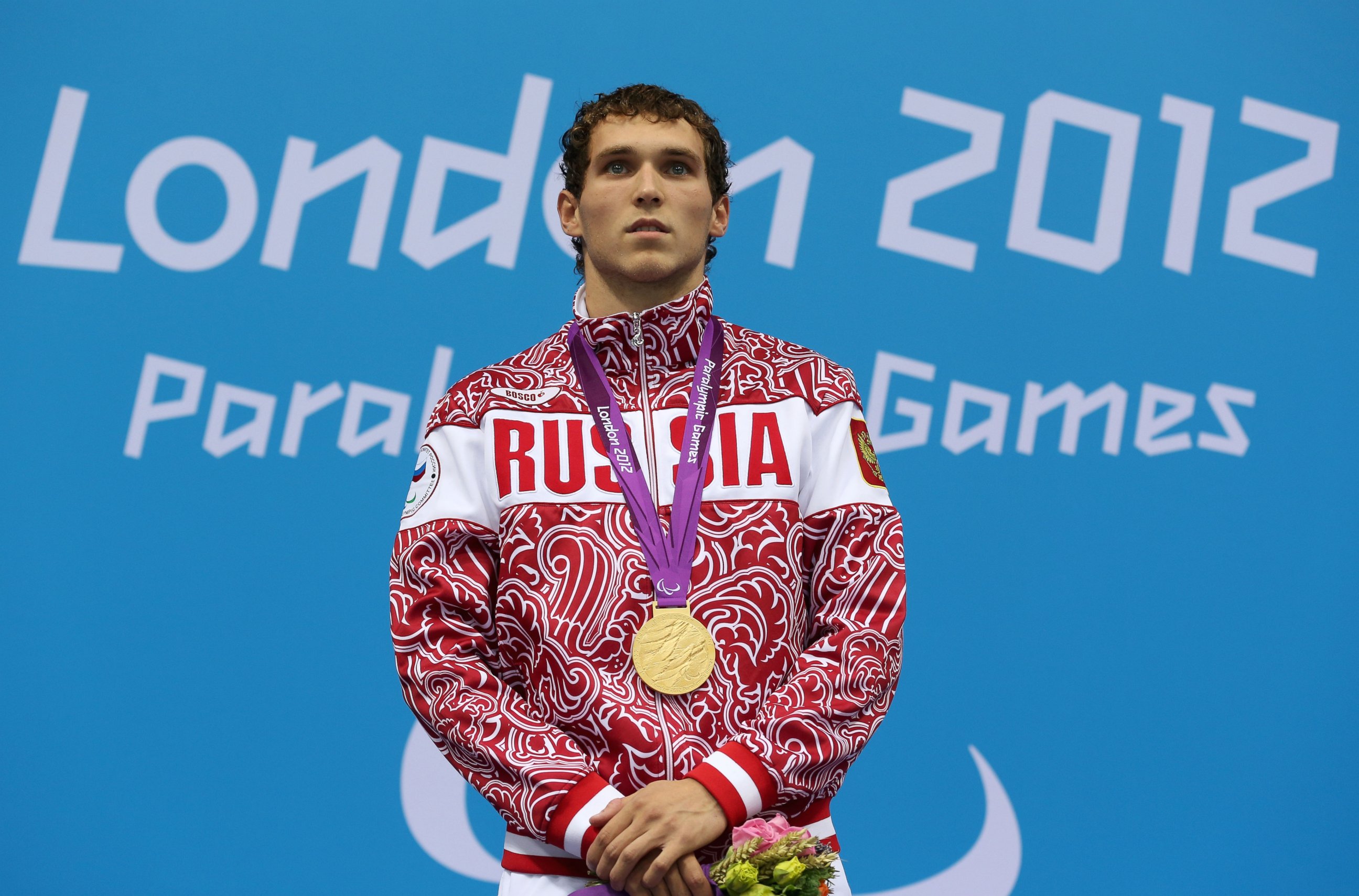 PHOTO: A Russian Paralympian poses on the podium during the medal ceremony at the  London 2012 Paralympic Games at Aquatics Centre, Sept. 3, 2012, in London. 