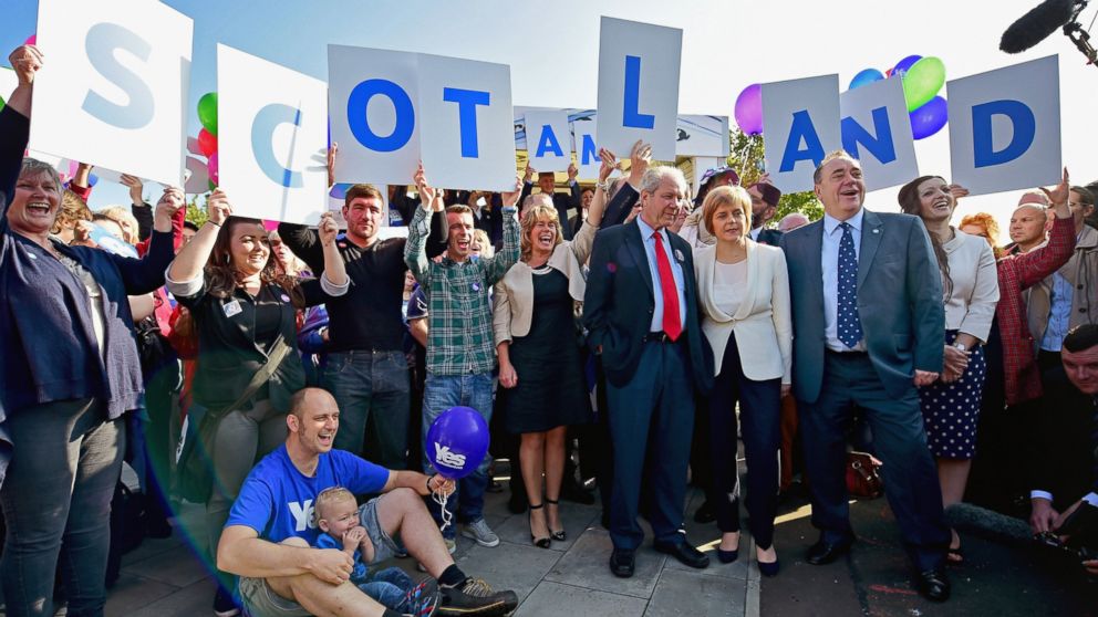 First Minister Alex Salmond, right, Deputy First Minister Nicola Sturgeon, center, and former deputy leader of the SNP Jim Sillars, left, campaign with ''Yes'' activists on Sept. 10, 2014 in Edinburgh, Scotland. 