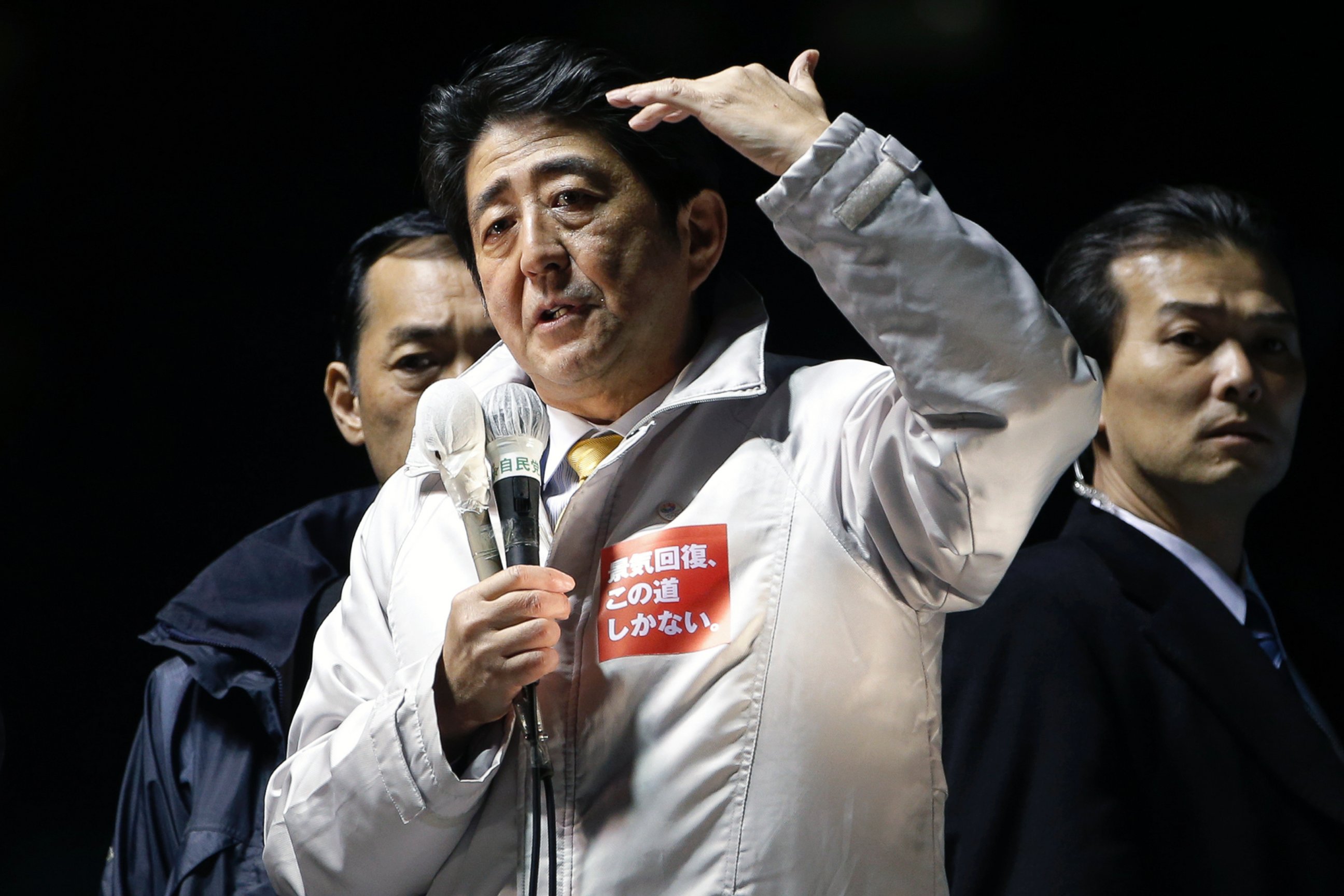 PHOTO: Shinzo Abe, Japan's prime minister and president of the Liberal Democratic Party (LDP), gestures as he speaks during an election campaign rally in Saitama City, Japan, Dec. 12, 2014.