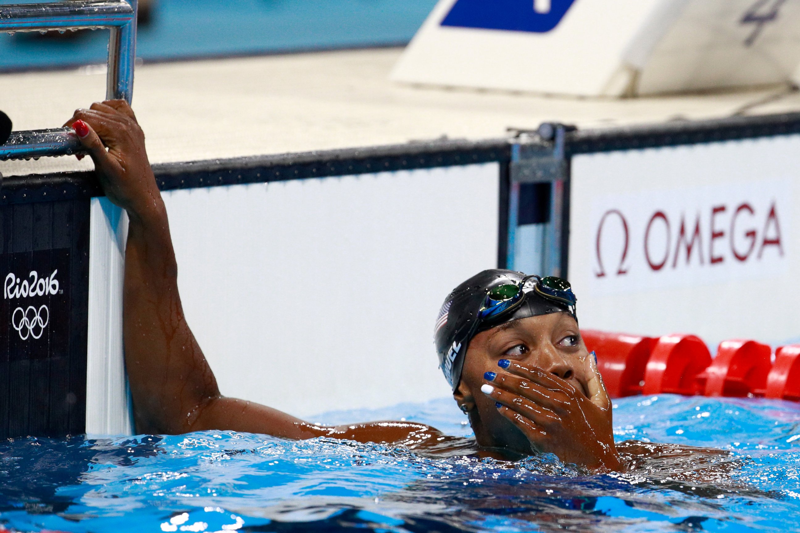 PHOTO: Simone Manuel of the United States celebrates winning gold in the Women's 100m freestyle final during the Rio 2016 Olympic Games, Aug. 11, 2016, in Rio de Janeiro.