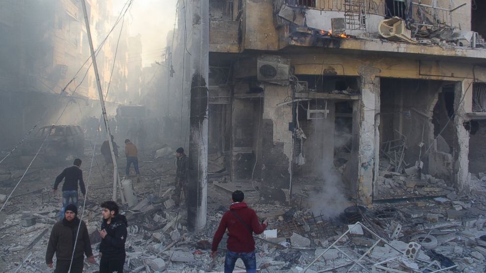 In this file photo, firefighters extinguish a fire after Daesh terrorists' car-bomb attack against Ahrar ash-Sham Headquarters in Aleppo, Syria, Jan. 25, 2016.