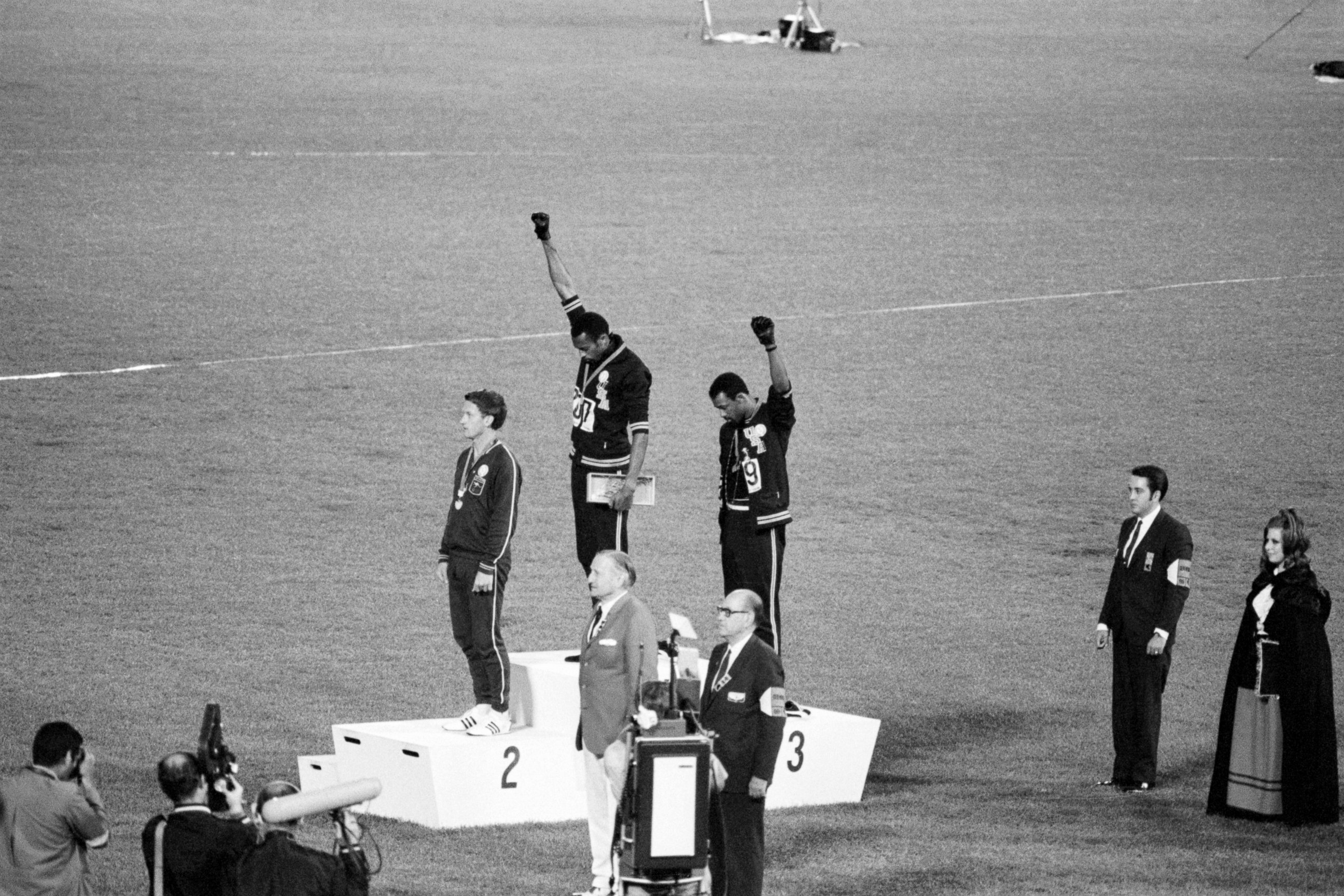 PHOTO: Tommie Smith and John Carlos, gold and bronze medalists in the 200-meter run at the 1968 Olympic Games, engage in a victory stand protest against unfair treatment of blacks in the United States.