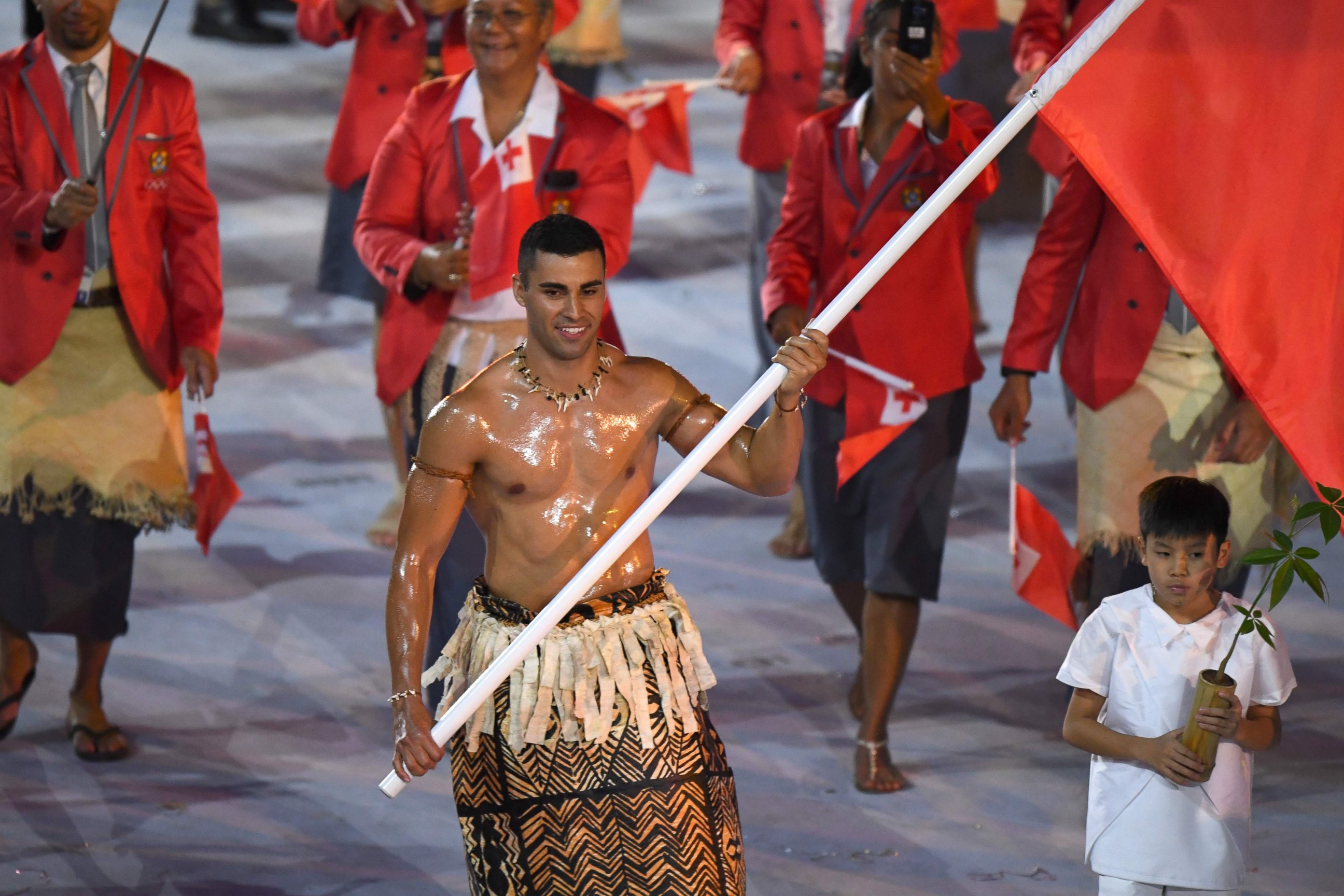 PHOTO: Tonga's flagbearer Pita Nikolas Taufatofua leads his delegation during the opening ceremony of the Rio 2016 Olympic Games at the Maracana stadium in Rio de Janeiro on Aug. 5, 2016. 