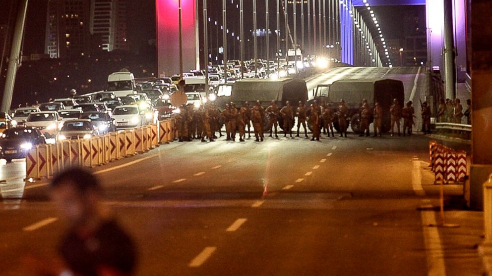 Turkish soldiers block Istanbul's Bosphorus Brigde on July 15, 2016 in Istanbul, Turkey.