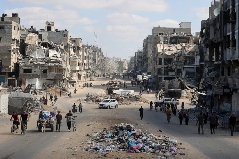 PHOTO: Palestinians carry their belongings as they flee areas north of Gaza City in the northern Gaza Strip on Oct. 12, 2024.