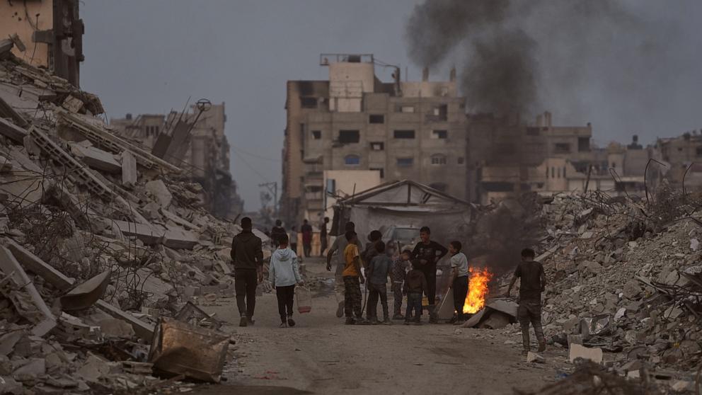PHOTO: Palestinians light fires to keep away mosquitoes amid the destruction left by Israeli air and ground offensive in the Sheikh Radwan neighborhood of Gaza City, on Nov. 11, 2025.