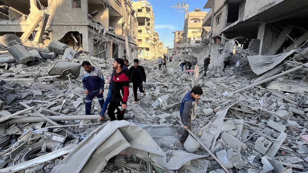 PHOTO: People check the rubble of a building hit in an overnight Israeli strike in Beit Lahiya in the northern Gaza Strip on Nov. 17, 2024.