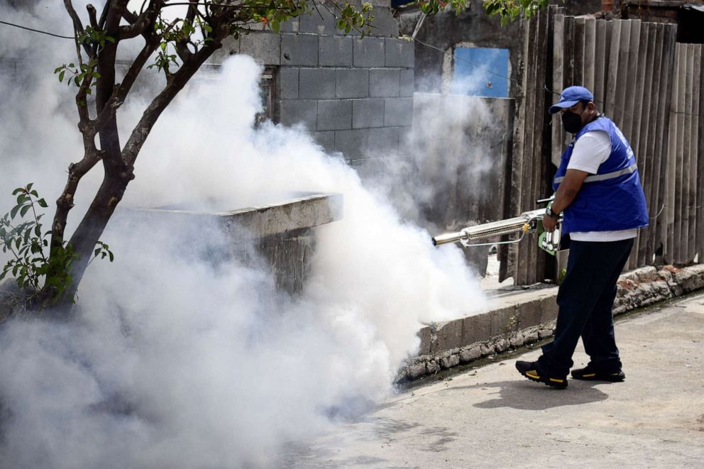 PHOTO: FILE - A municipal worker spreads chemicals against mosquitoes during a fumigation operation against the Aedes Aegypti and Aedes Albopictus mosquitos, responsible for the transmission of Dengue, Zika, April 27, 2022 in San Salvador, El Salvador.