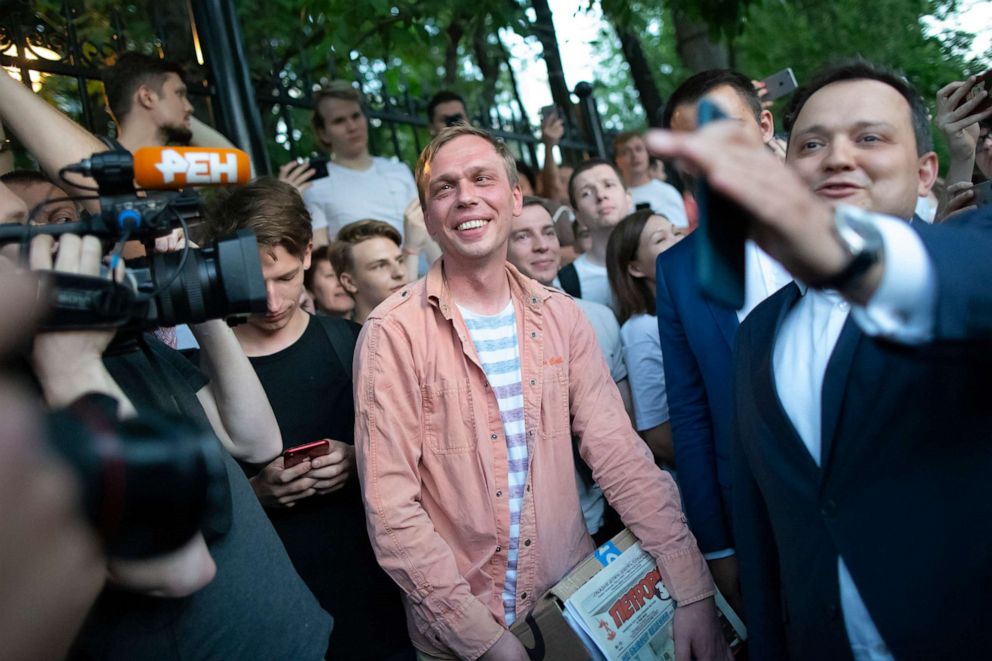 PHOTO: Russian investigative journalist Ivan Golunov smiles as he leaves a Investigative Committee building in Moscow, June 11, 2019.