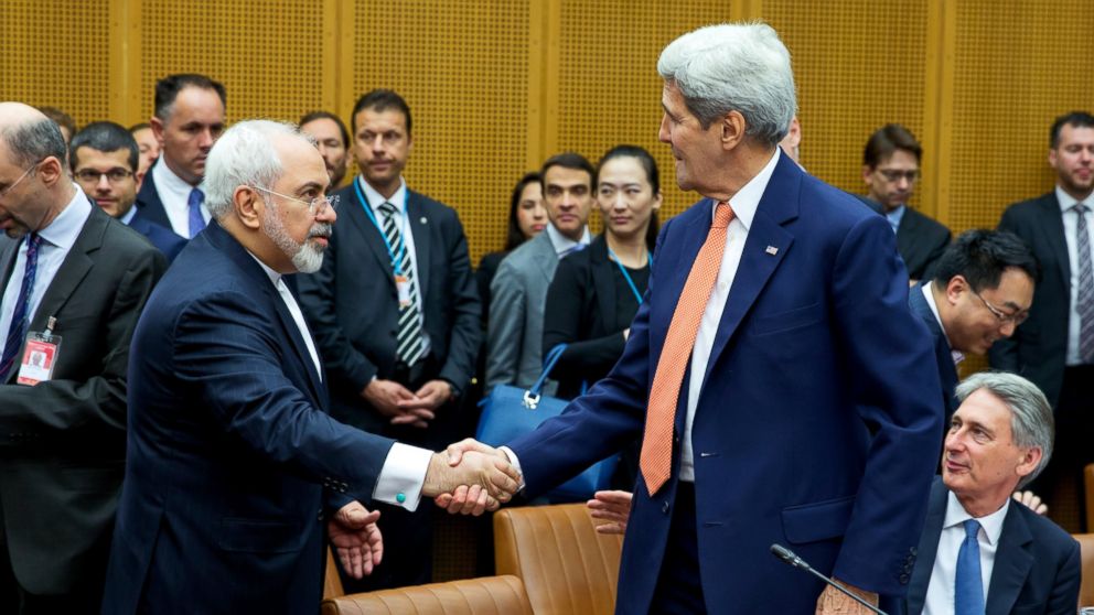 PHOTO: Foreign Minister of Iran, Mohammad Javad Zarif shakes hands with US Secretary of State John Kerry at the last working session of nuclear negotiations on July 14, 2015 in Vienna, Austria.