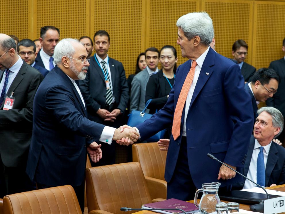 PHOTO: Foreign Minister of Iran, Mohammad Javad Zarif shakes hands with US Secretary of State John Kerry at the last working session of nuclear negotiations on July 14, 2015 in Vienna, Austria.