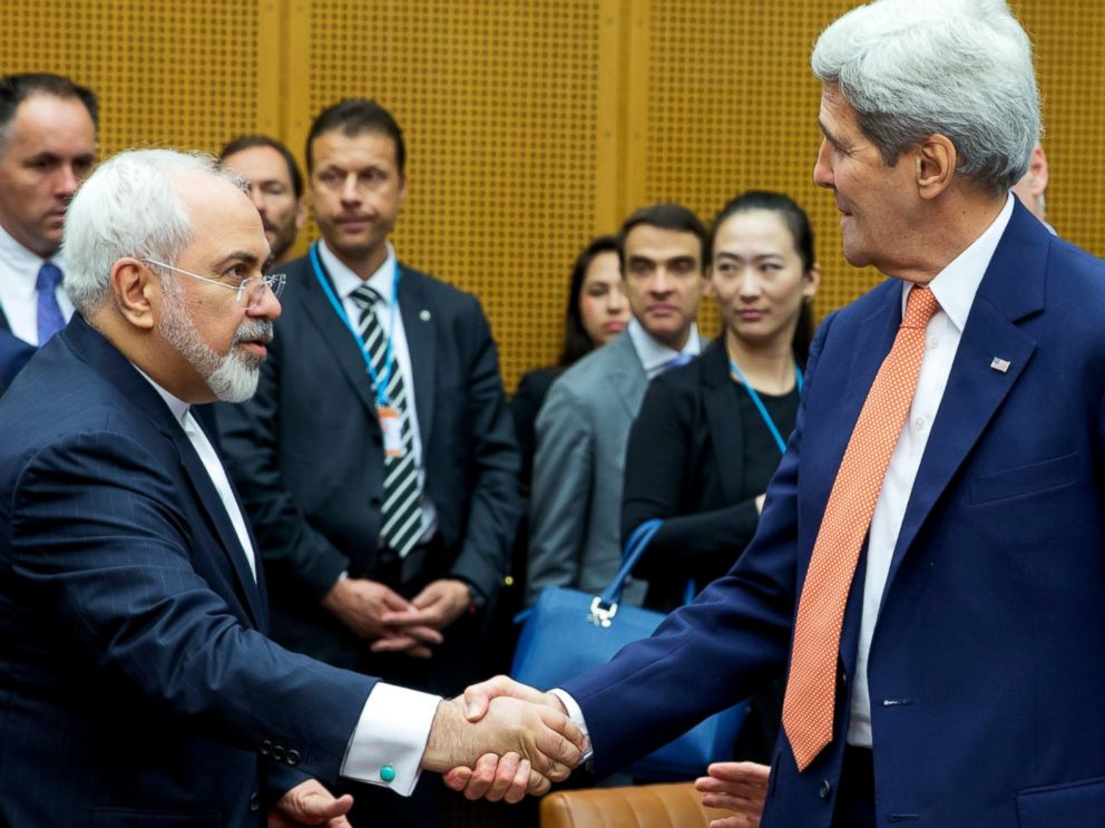 PHOTO: Foreign Minister of Iran, Mohammad Javad Zarif shakes hands with US Secretary of State John Kerry at the last working session of nuclear negotiations on July 14, 2015 in Vienna, Austria.