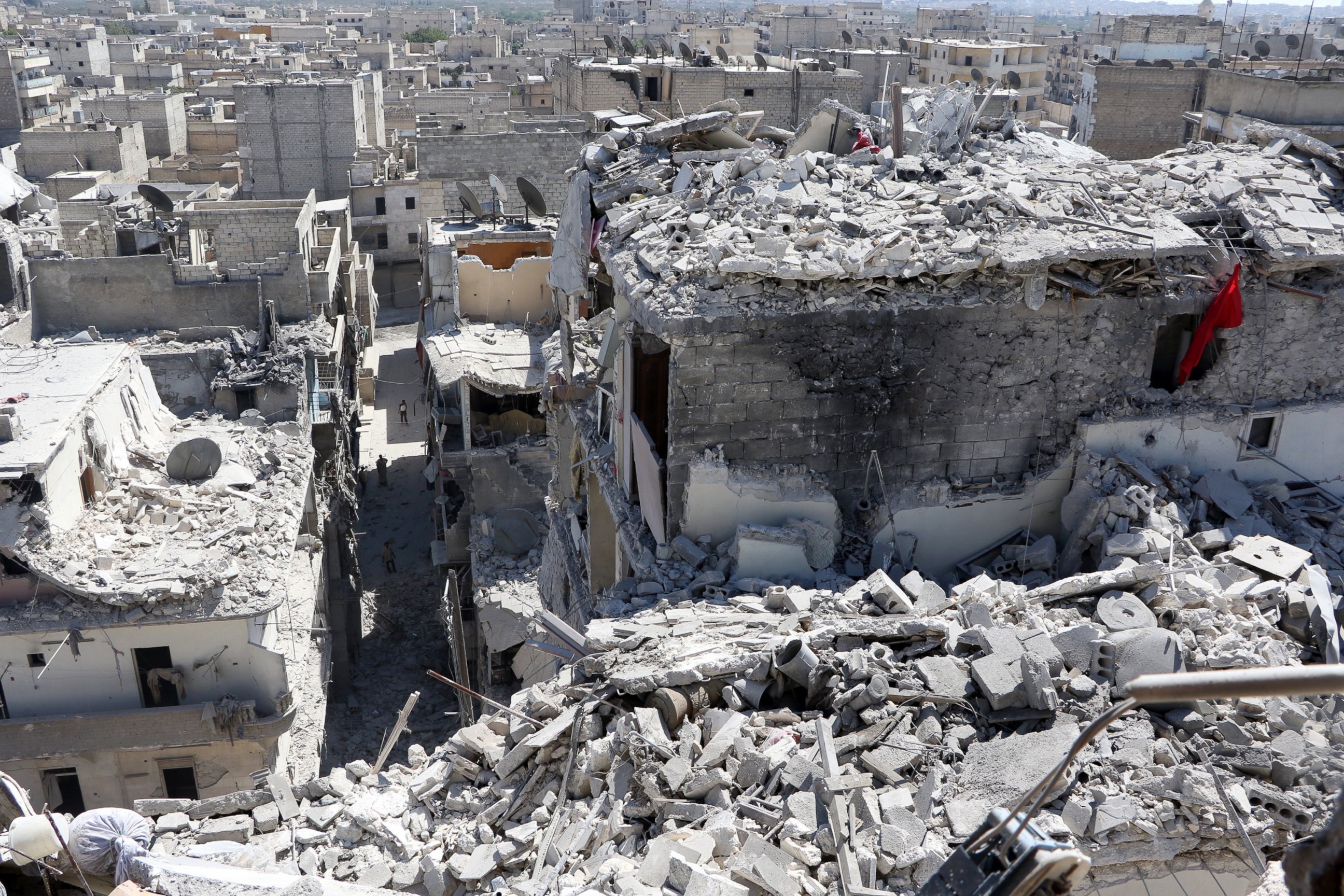 PHOTO:  Debris of the buildings are seen after the Russian army hit the residential area with cluster  bombs over opposition controlled Salihin neighborhood of Aleppo, Syria on September 11, 2016.