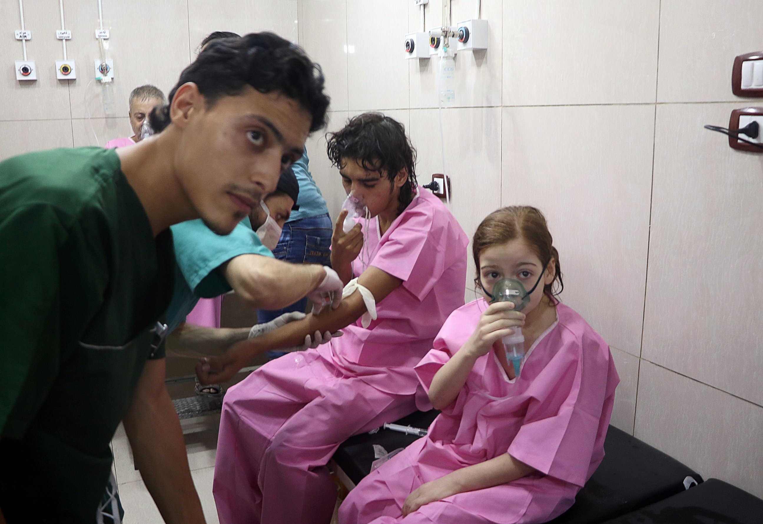 PHOTO: Civilians receive medical treatment after a helicopter belonging to the Assad regime forces carried out a barrel bomb attack over residential areas at opposition controlled Sukkeri region of Aleppo, Syria on September 6, 2016.