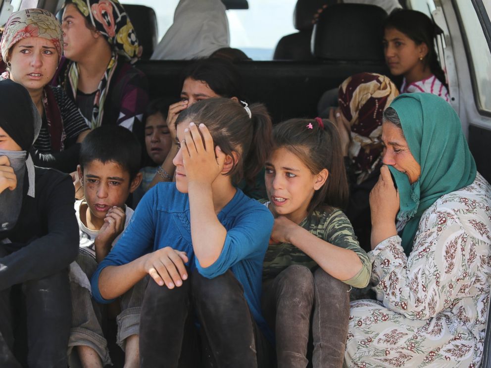 PHOTO:Relatives mourn during funeral of Syrian children Aylan, Galip, and their mother Rehan Kurdi, Sept. 4, 2015, in the Syrian border town of Kobani.