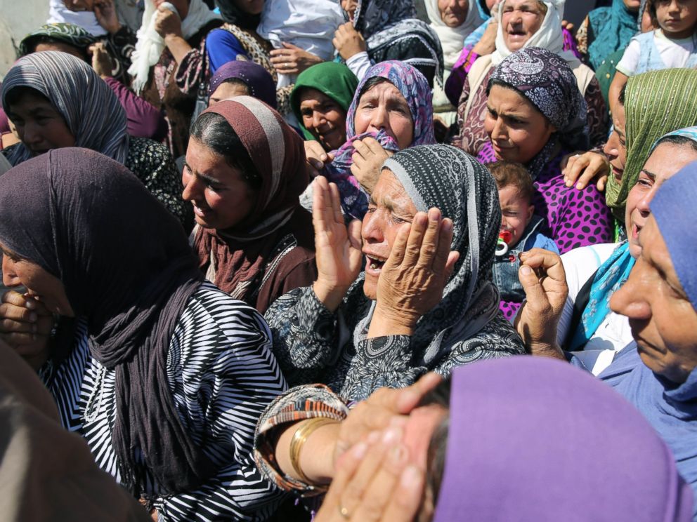 PHOTO: Relatives mourn during funeral of Aylan his brother Galip and their mother Zahin Kurdi, 27, who drowned after their boat sank en route to the Greek islands in the Aegean Sea, in the Syrian border town of Kobani, Sept. 4, 2015.