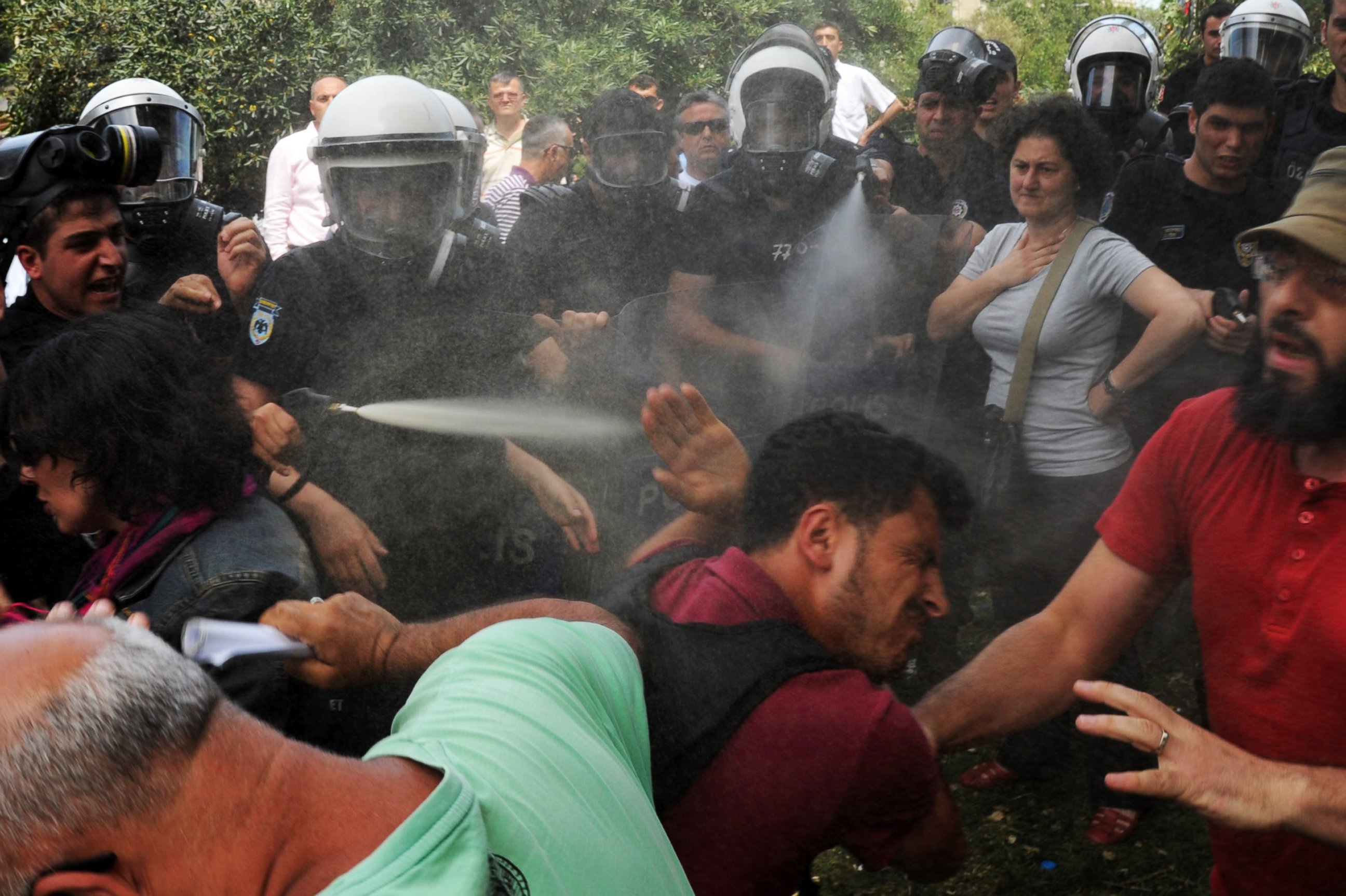 PHOTO: Turkish riot policemen clash on May 28, 2013 with demonstrators protesting against the demolition of Taksim Gezi Park in Istanbul. 