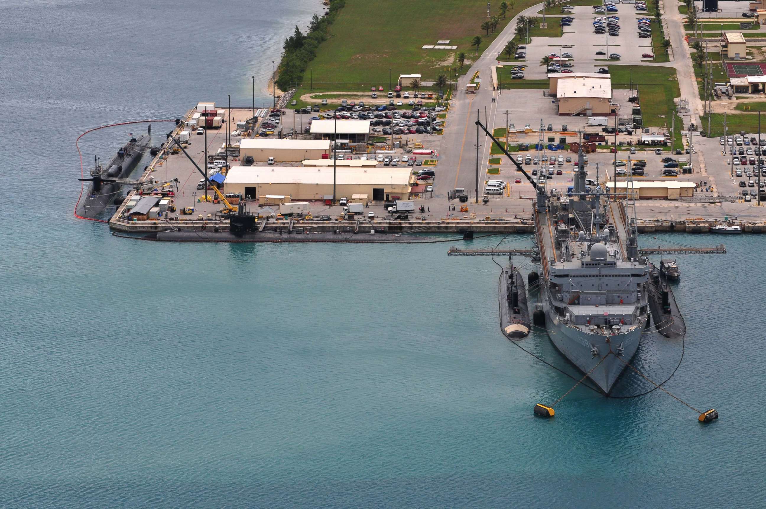 PHOTO: The submarine tender USS Emory S Land AS 39 provides support services to the various Los Angeles-class fast attack submarines and the Ohio-class guided-missile submarines at Polaris Point, Guam. 