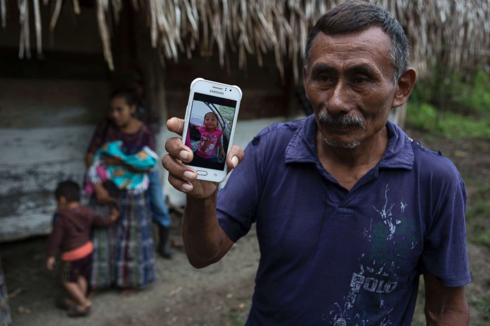 PHOTO: Domingo Caal Chub, 61, holds a smartphone displaying a photo of his granddaughter, Jakelin Amei Rosmery Caal Maquin, in Raxruha, Guatemala, Dec. 15, 2018. 