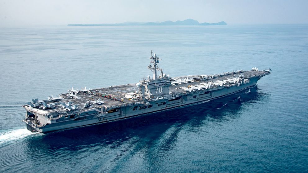 PHOTO: A Dept. of Defense handout photo showing the aircraft carrier USS Carl Vinson (CVN 70) as it transits the Sunda Strait, near Indonesia. 