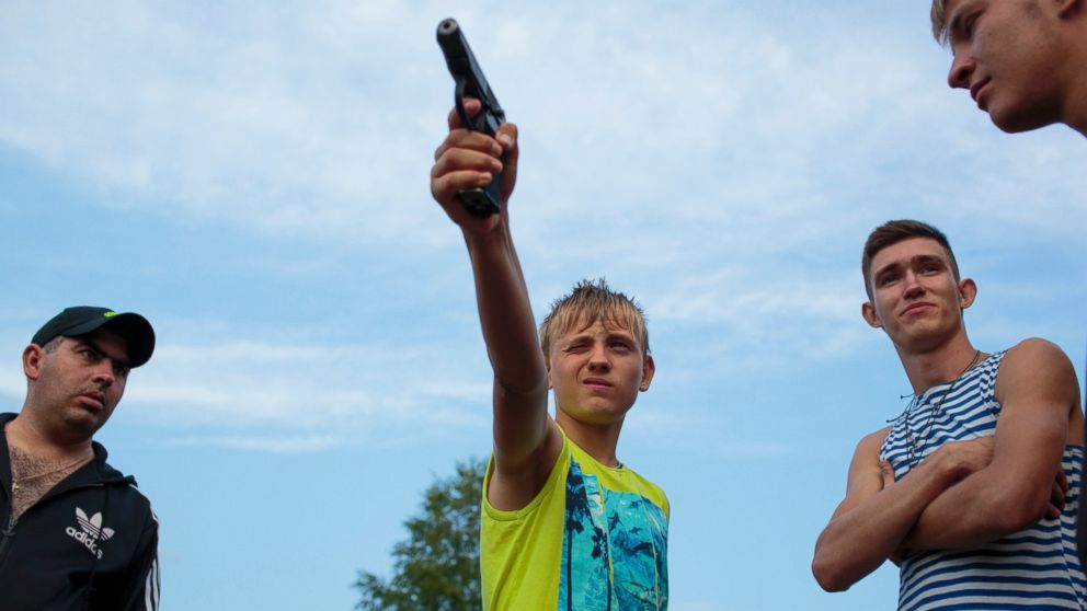 PHOTO: Igor Fast, 14,  from Stavropol practices shooting before the start of the "Orthodox Warrior" camp. They are using air-soft guns for practice and competitions.