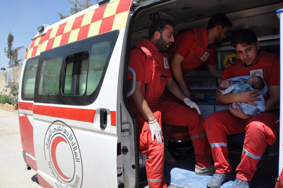 PHOTO:The Syrian Red Crescent moved conjoined twins Nawras and Moaz from Ghouta to a hospital in Damascus.
