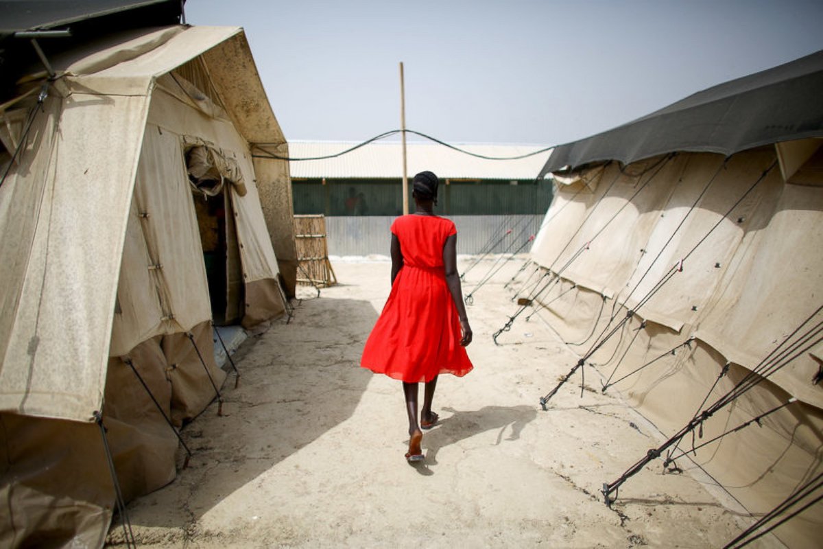 PHOTO:A woman walks between two of the tents that house the hospital ward in an image shot on assignment for NPR published with "'Embedded' With Doctors Without Borders," on May 28, 2016. 
