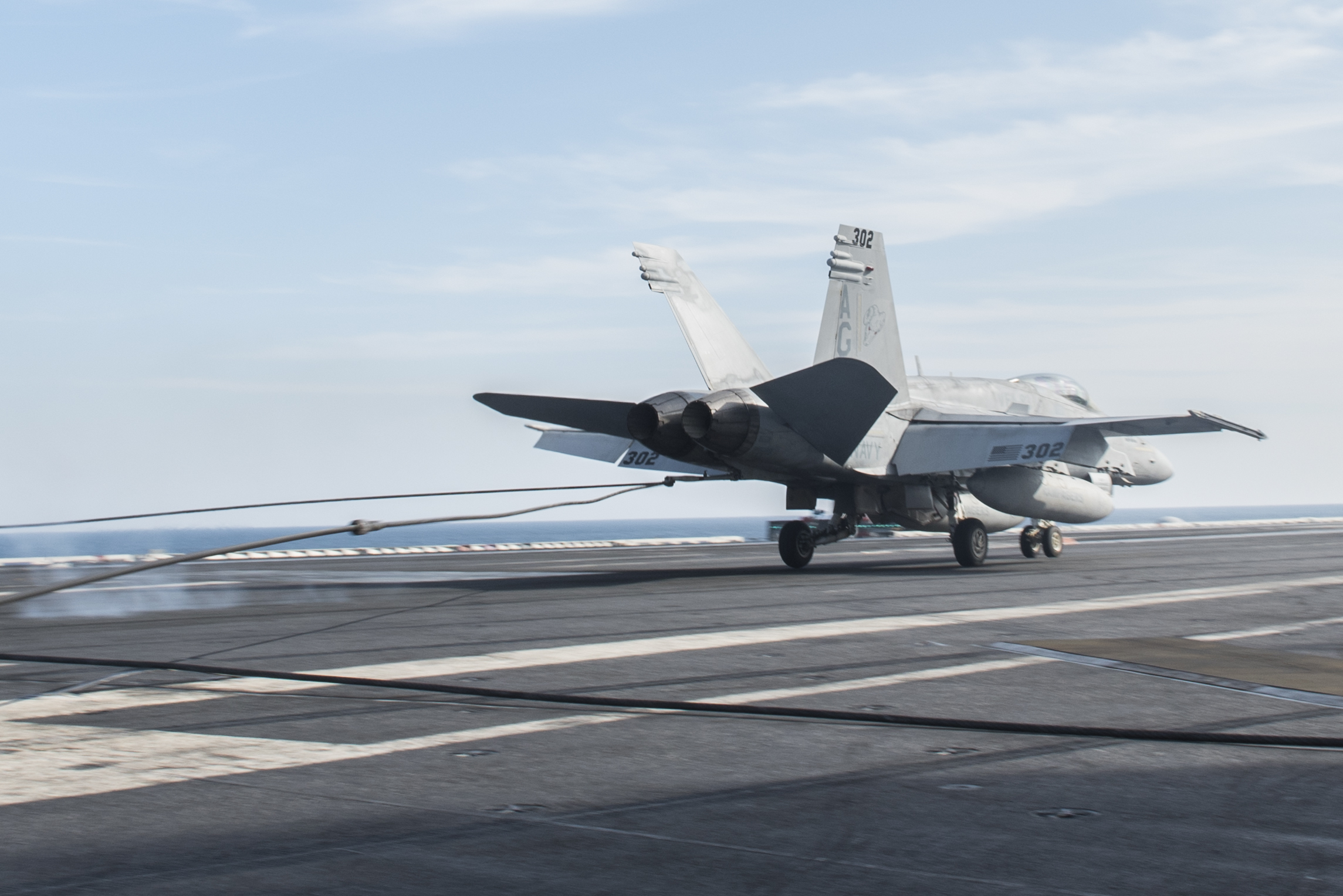 PHOTO: On Dec. 25, 2015, Capt. Frederick "Lucky" Luchtman completes his 1,000th arrested landing while flying an F/A-18C Hornet on the flight deck of aircraft carrier USS Harry S. Truman (CVN 75).