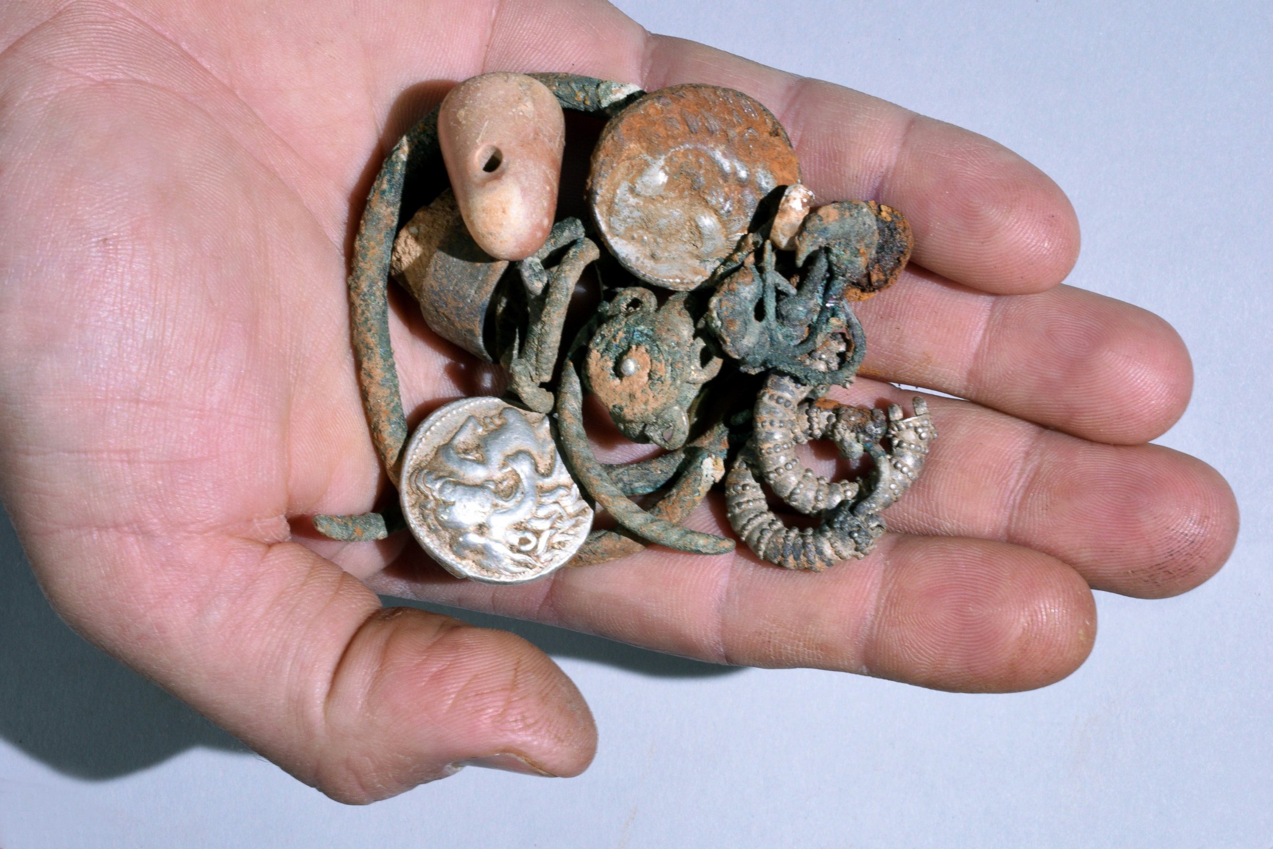 PHOTO: A photograph from the Israel Antiquities Authority shows silver objects found in a cave in northern Israel.