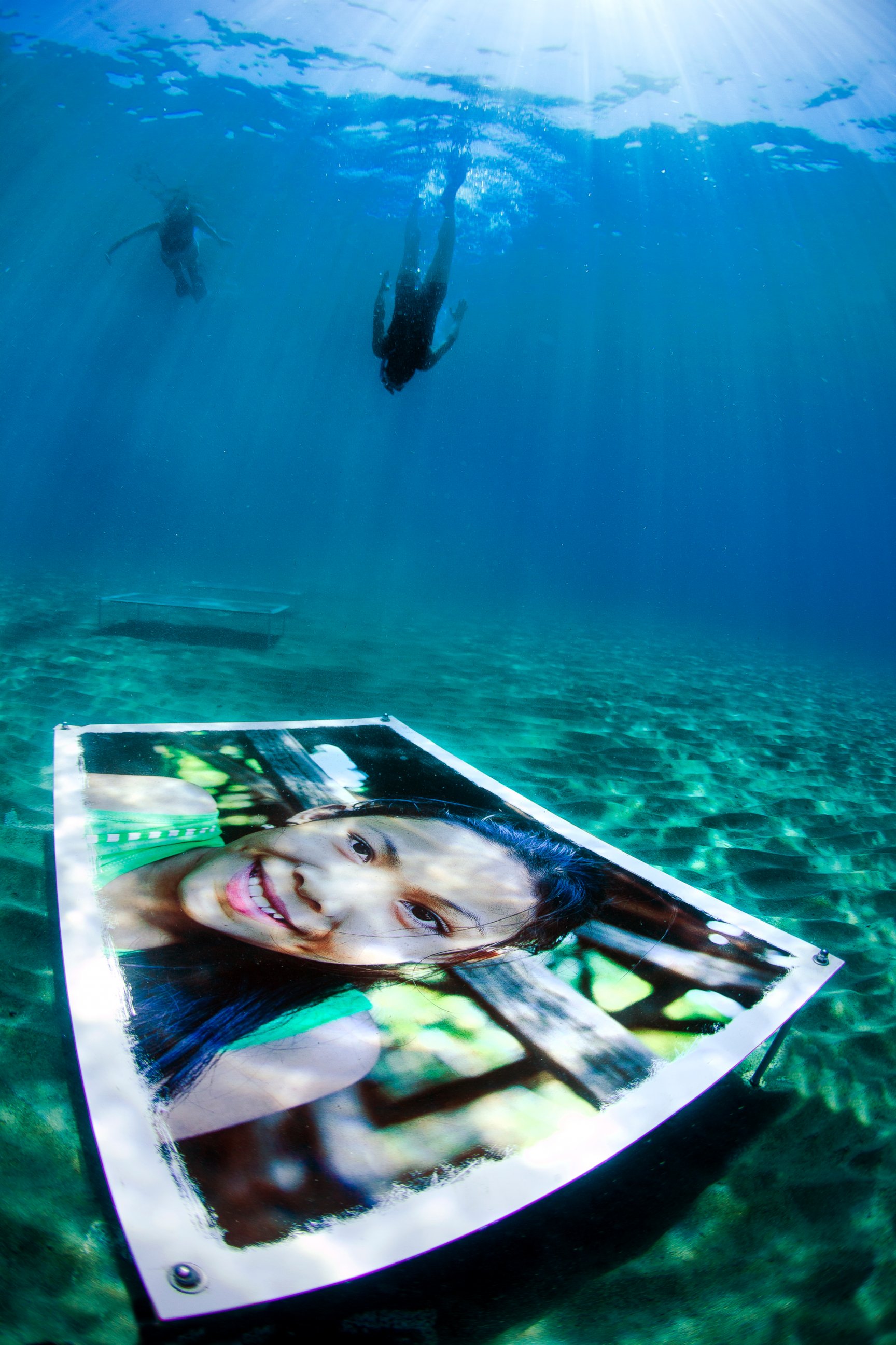 PHOTO: The collection of 28 photos from Southeast Asia is arranged in a circle 13 feet deep.