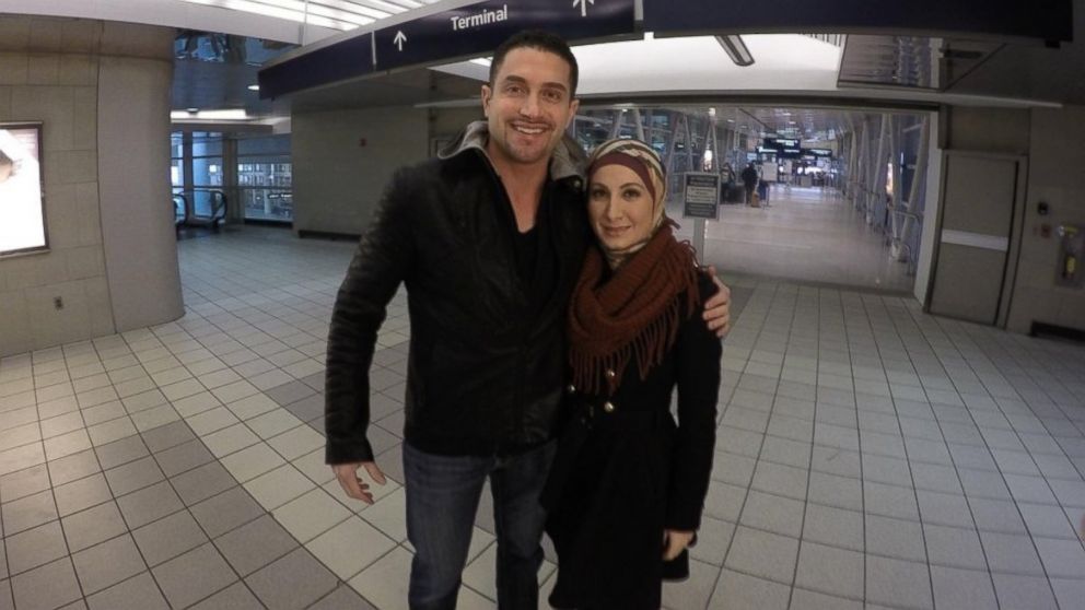 PHOTO: Sarah Hekmati and her husband Dr. Ramy Kurdi in the Detroit airport enroute to Germany to meet Hekmati's brother, Amir Hekmati, who was released from Iran.